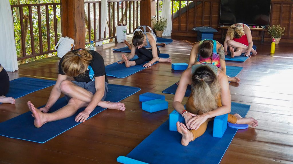 women practicing yoga